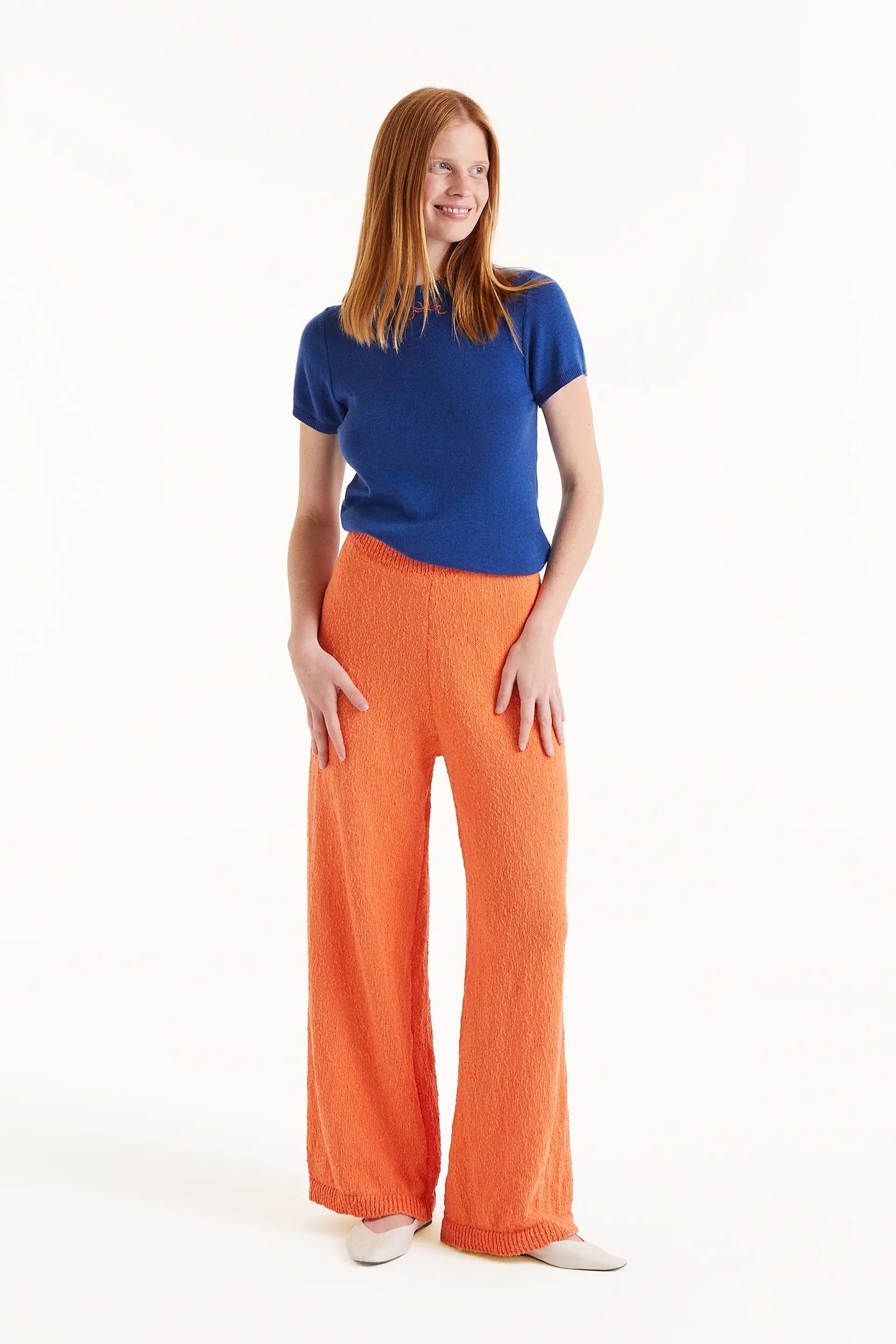 Pantaloni lunghi dritti in maglia arancione