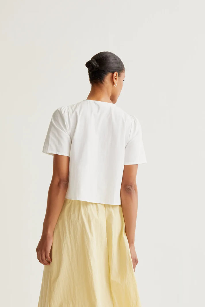 Top 100% cotone con bottoni multicolori