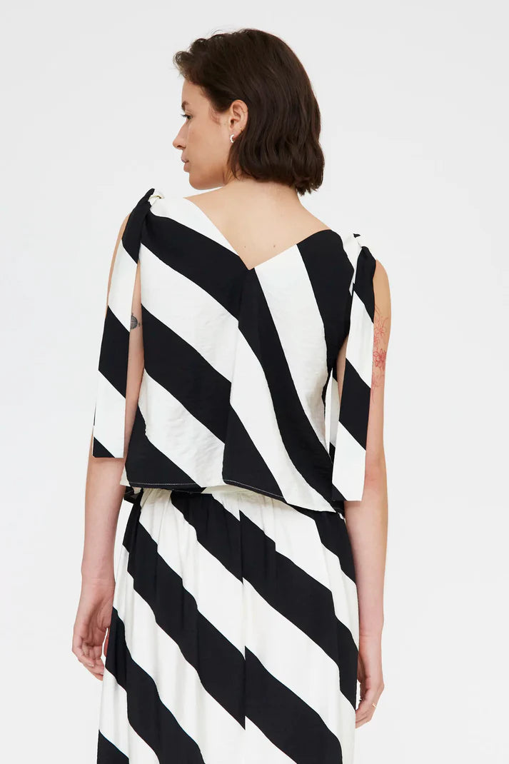 Top con stampa a righe diagonali bianco e nero