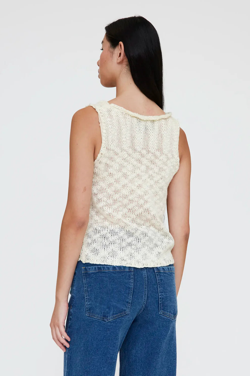 Top a maglia traforata beige