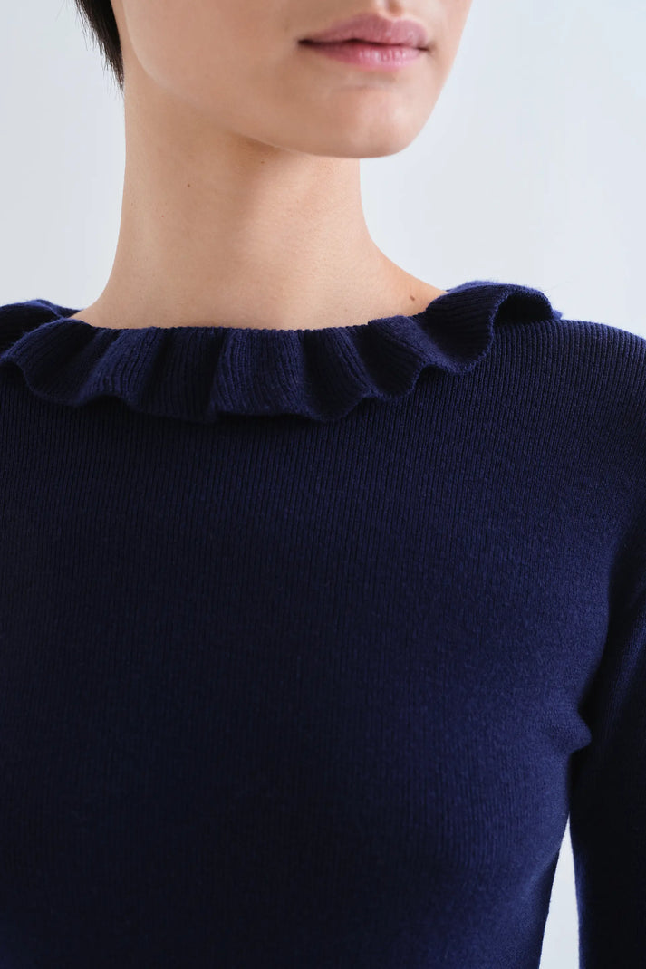 Top con volant in maglia blu navy