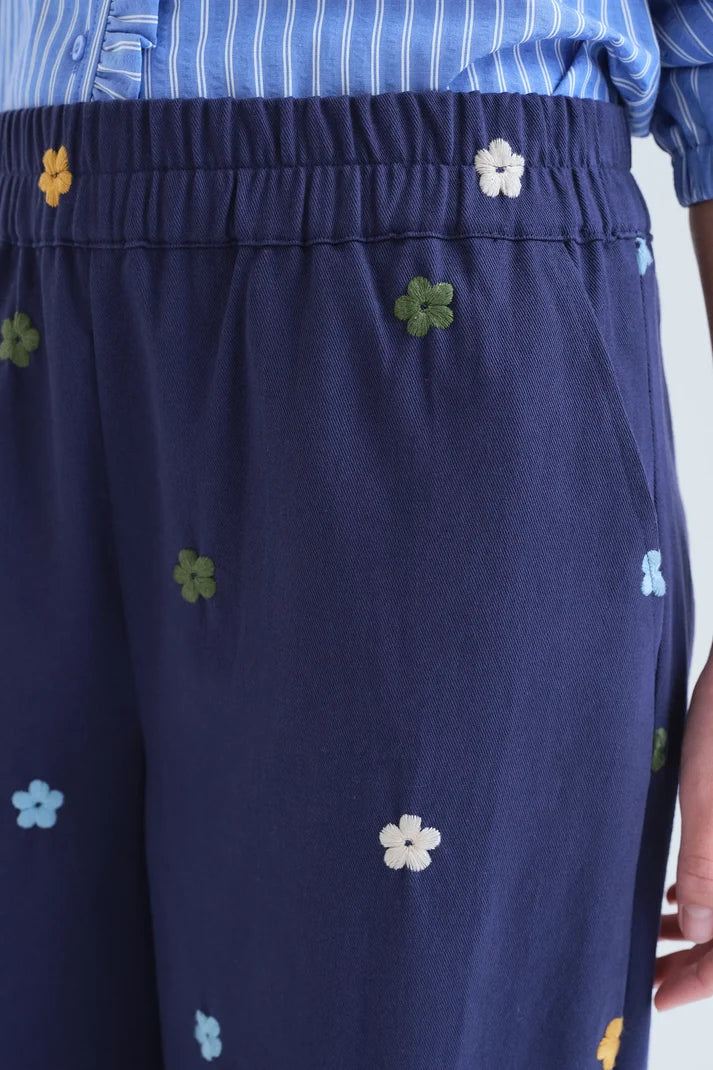 Pantaloni 100% cotone blu navy con ricamo floreale