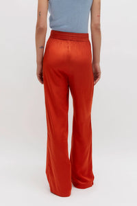 Pantaloni fluidi in raso arancione