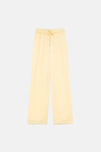 Pantaloni fluidi in raso giallo