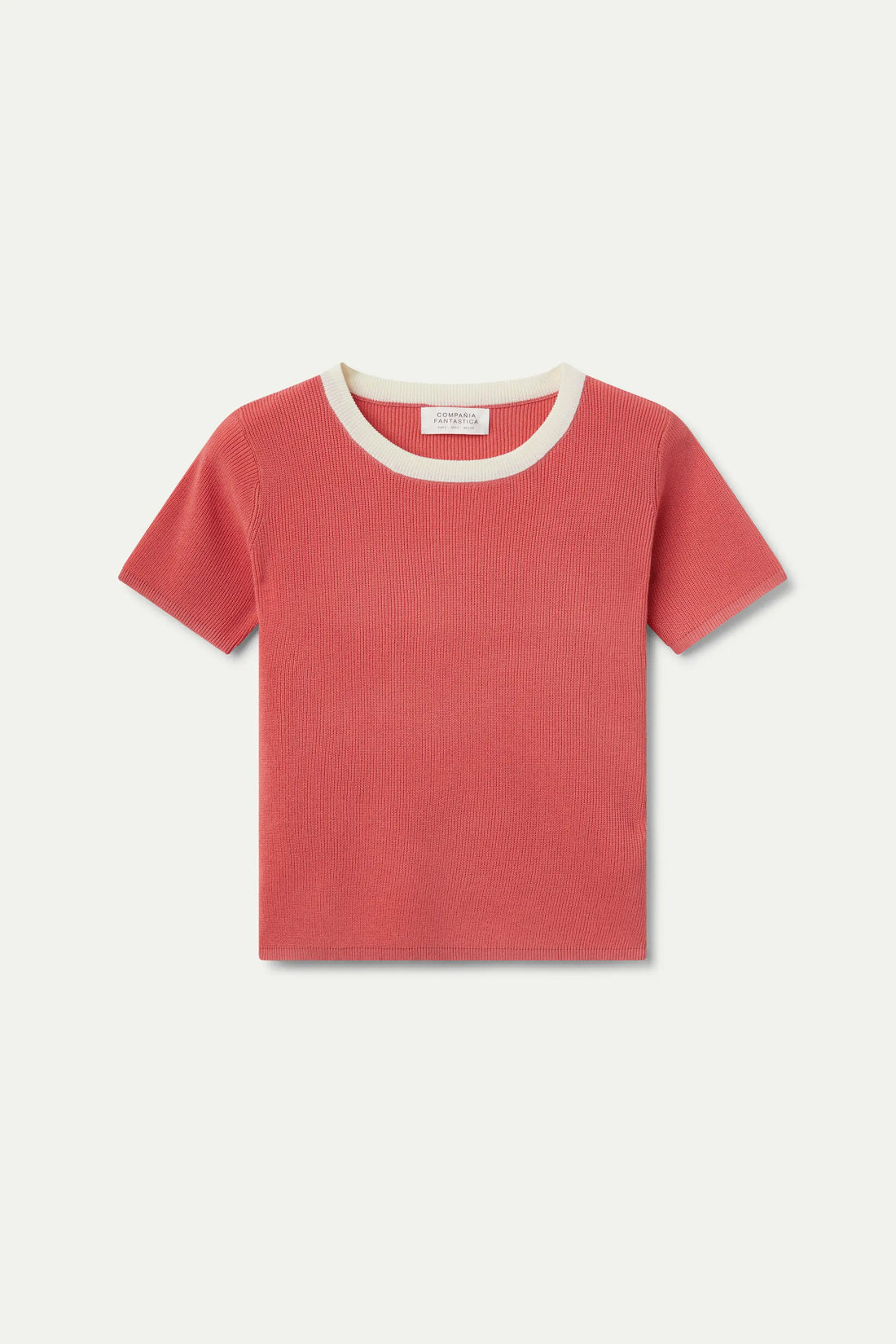 Top in maglia rosa a maniche corte
