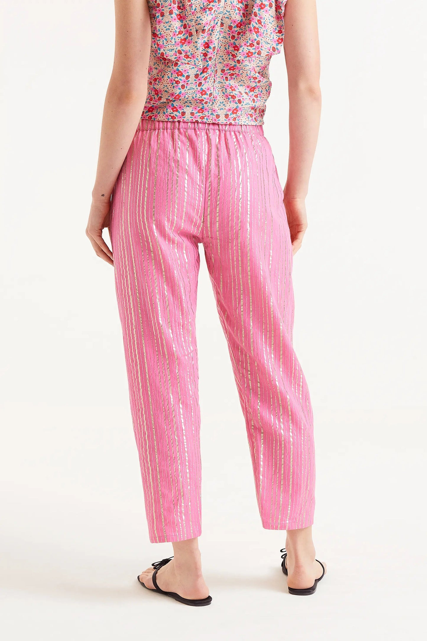 Pantaloni lunghi in lurex rosa