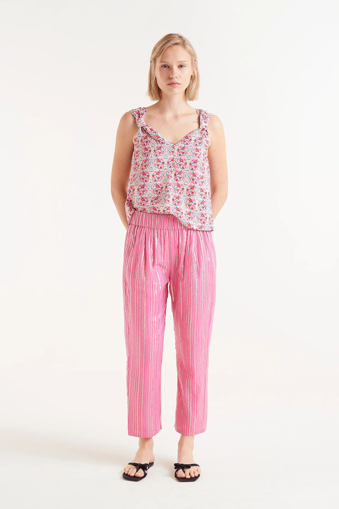Pantaloni lunghi in lurex rosa