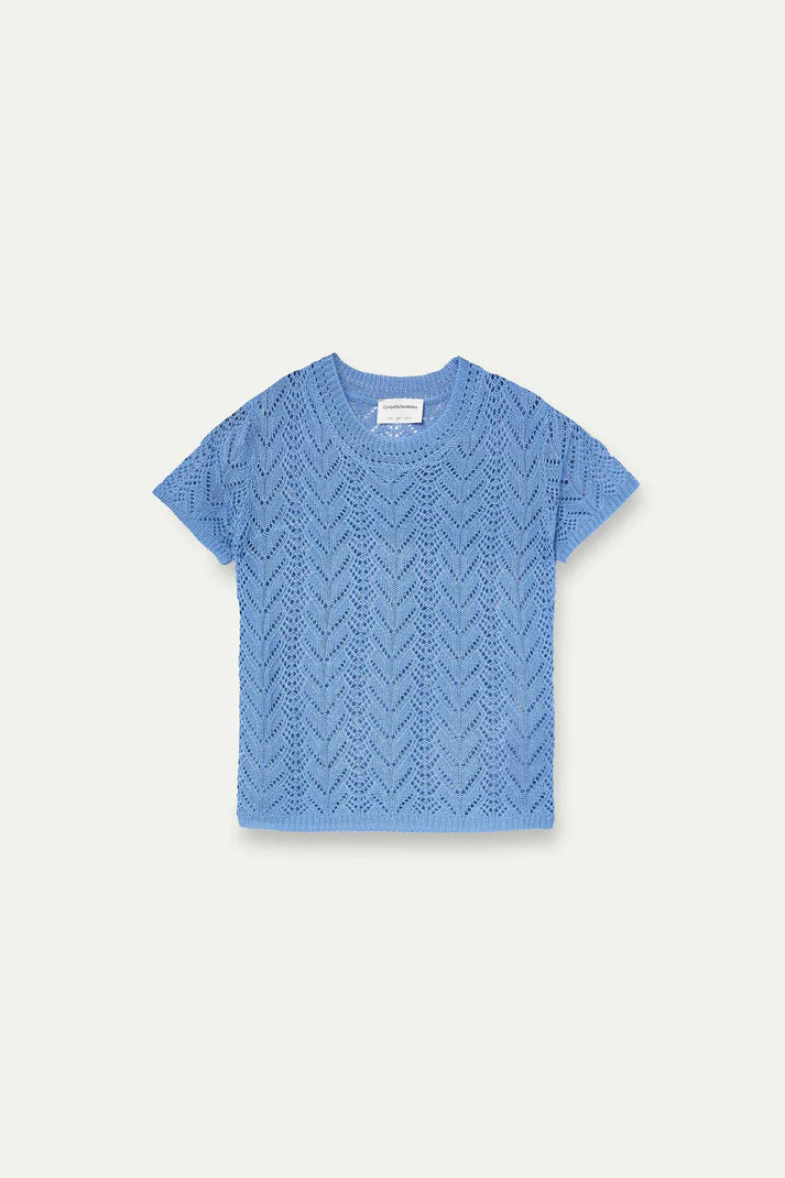 Top ricamato traforato a forma di fiore azzurro