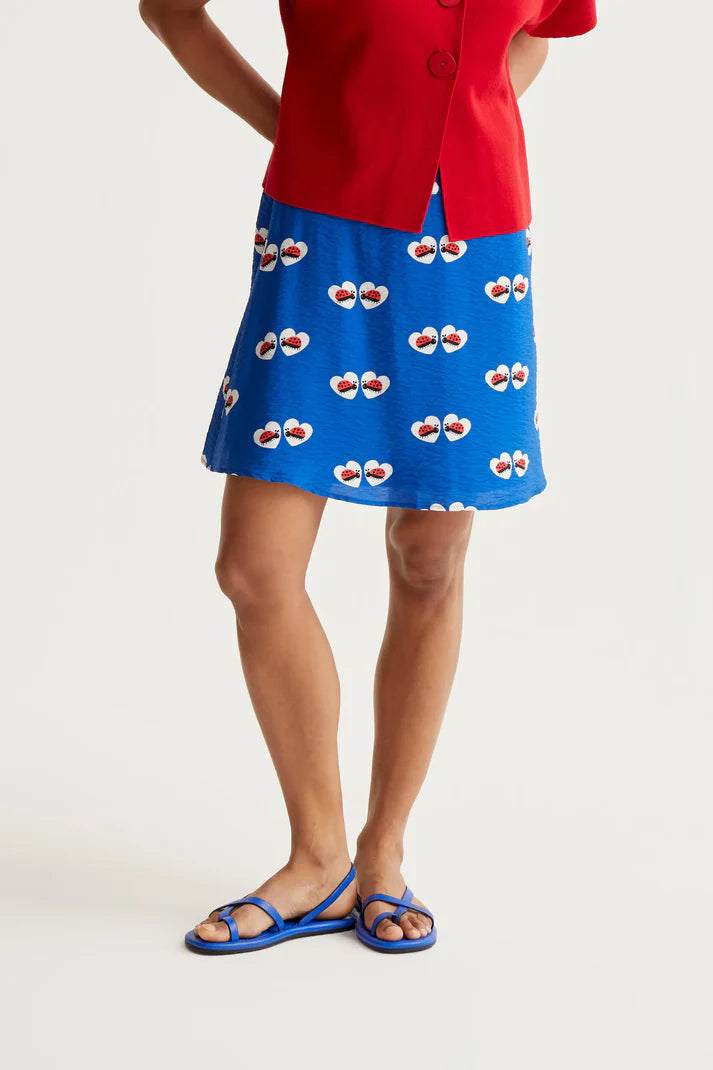 Gonna corta con stampa Coccinella