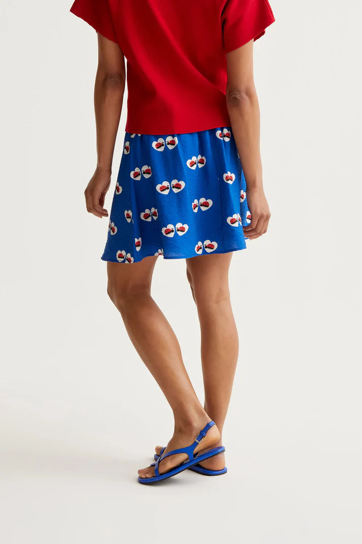 Gonna corta con stampa Coccinella