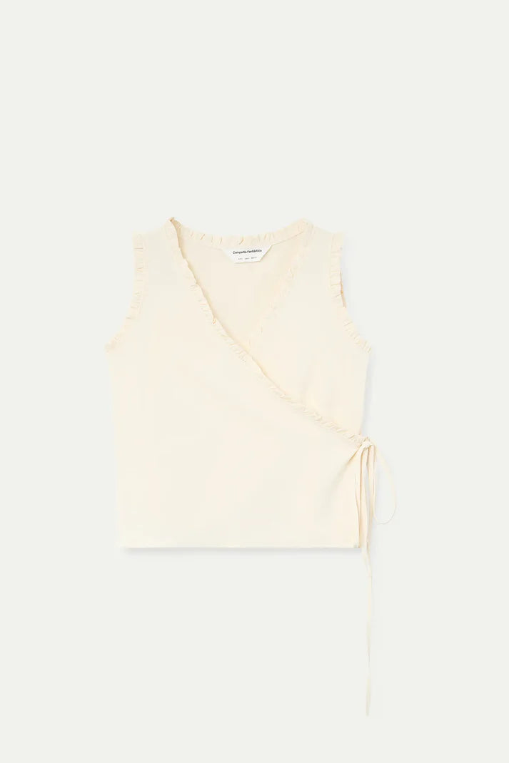 Top bianco sporco con scollo a V
