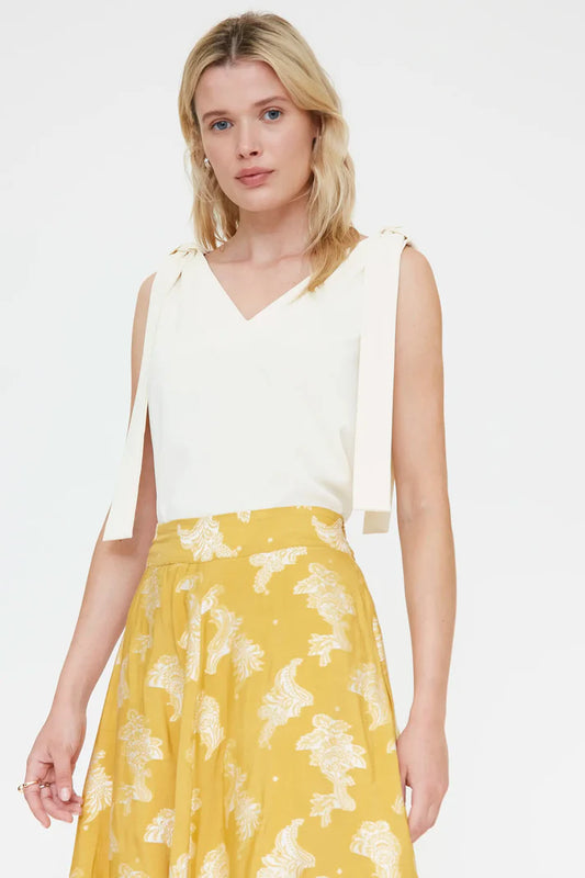 Top bianco sporco con spalline allacciate