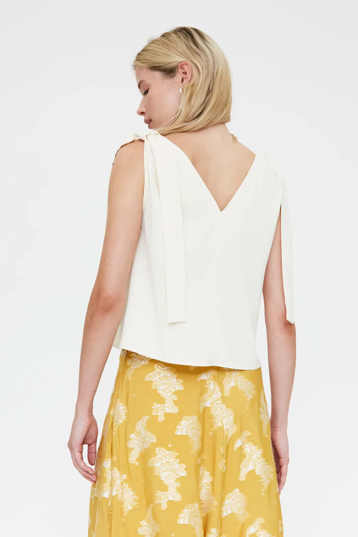 Top bianco sporco con spalline allacciate