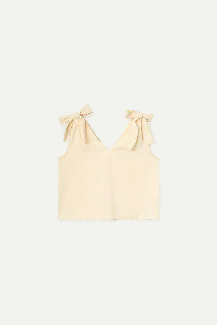 Top bianco sporco con spalline allacciate