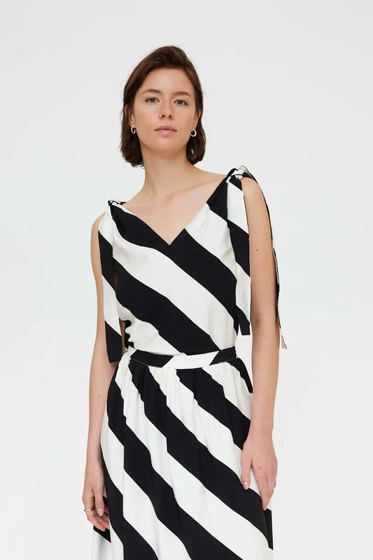 Top con stampa a righe diagonali bianco e nero