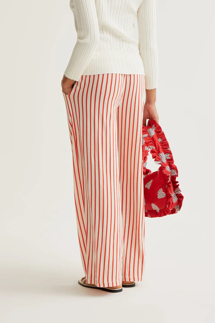 Pantaloni con stampa a righe rosse