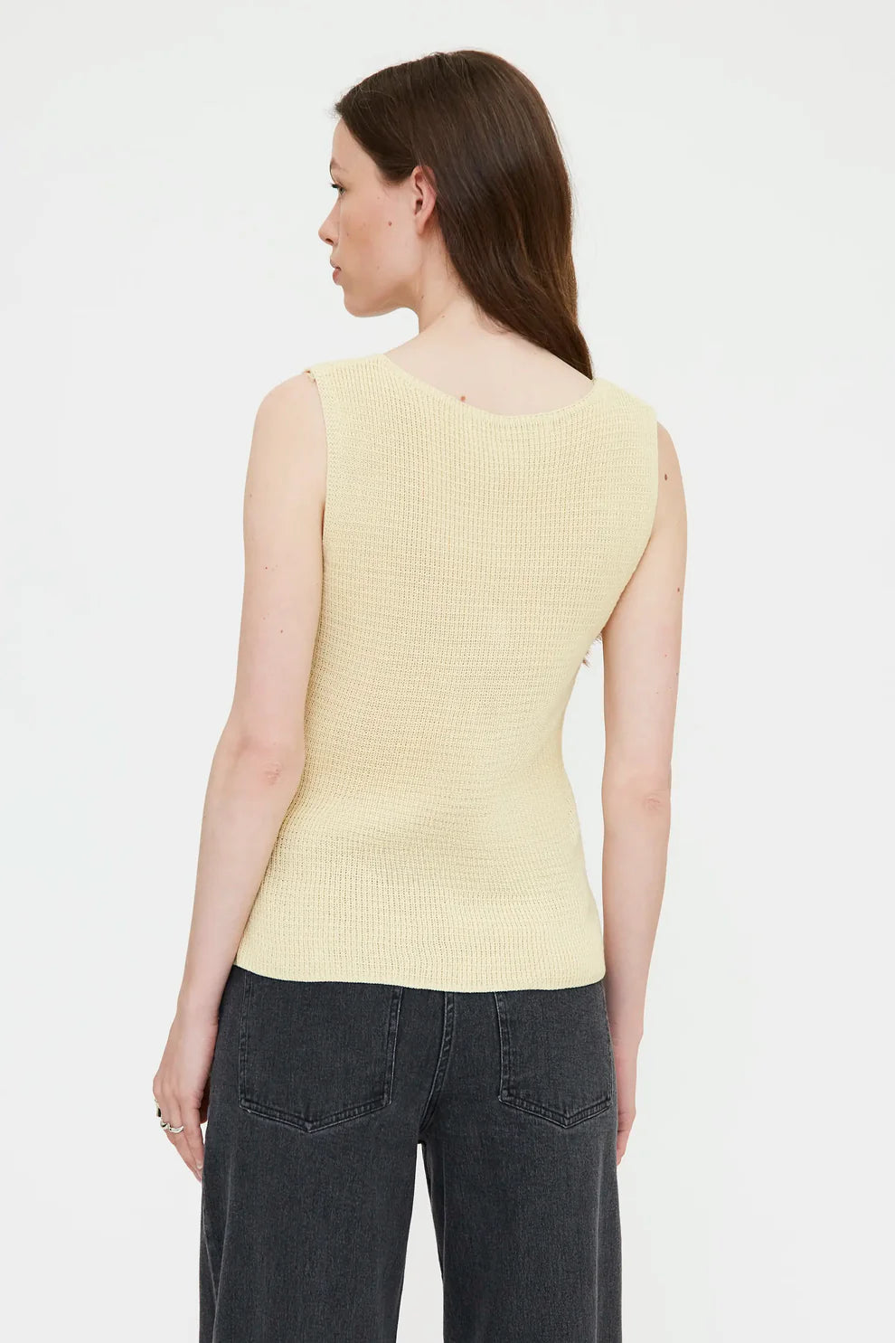 Top a maglia con bottoni gialli
