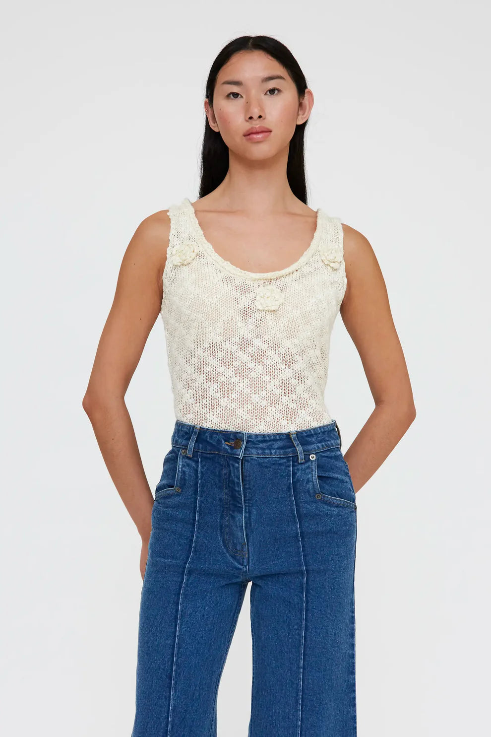 Top a maglia traforata beige
