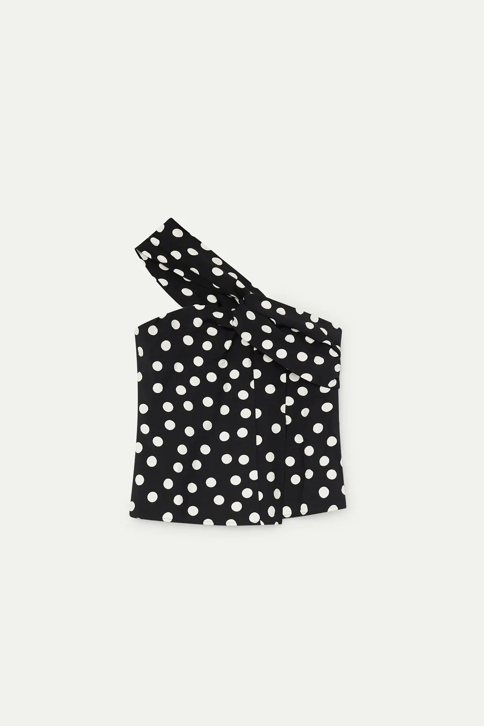 Top asimmetrico con stampa a pois bianco e nero