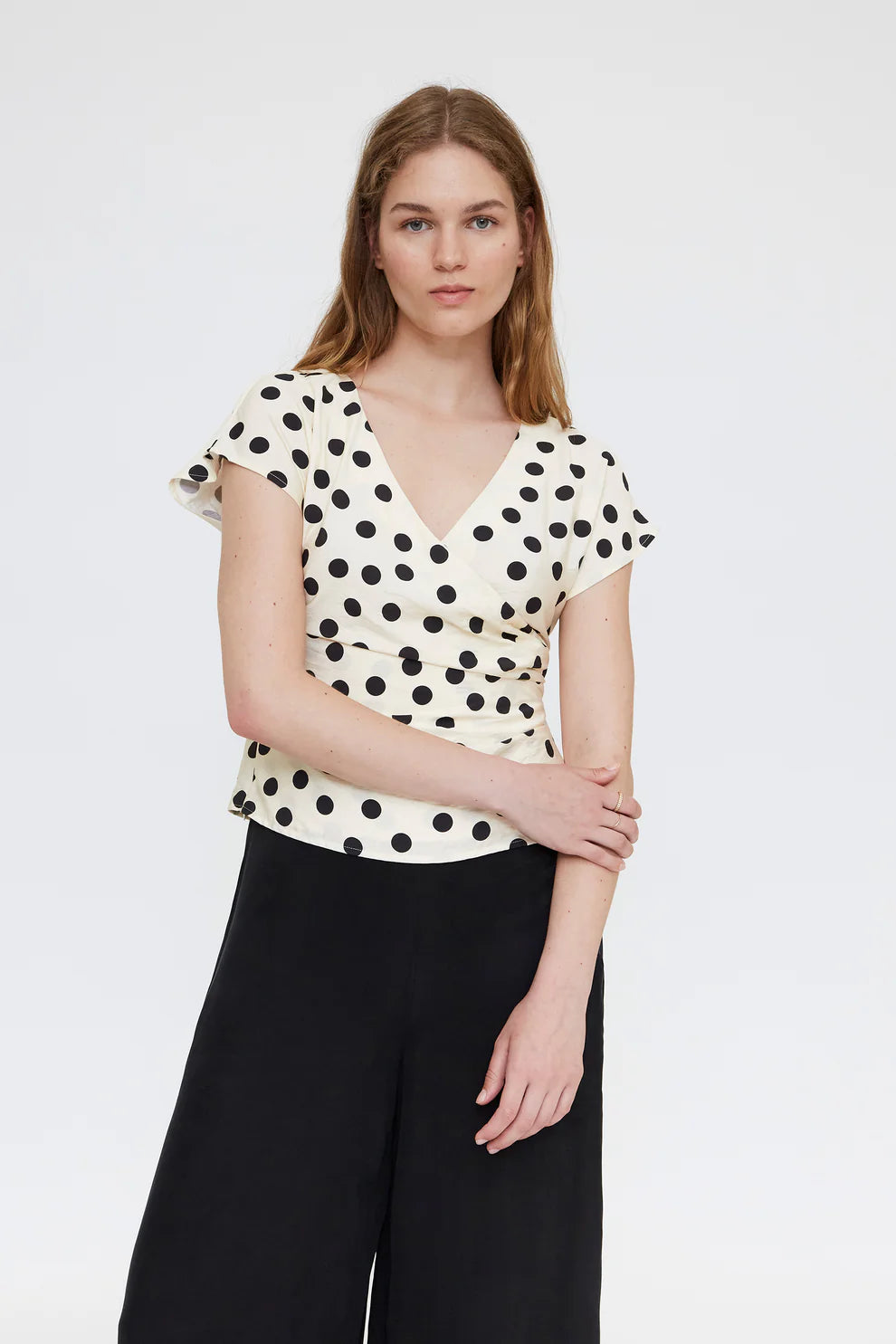 Top con stampa maglia bianca e nera