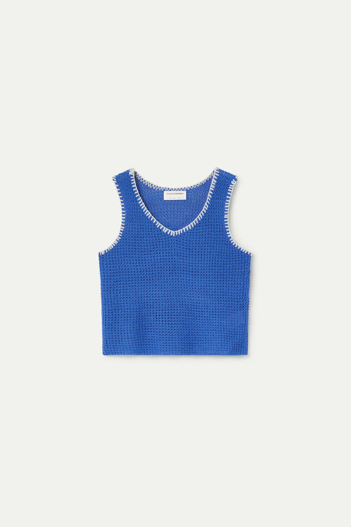 Top in maglia traforata blu con dettagli ricamati in bianco