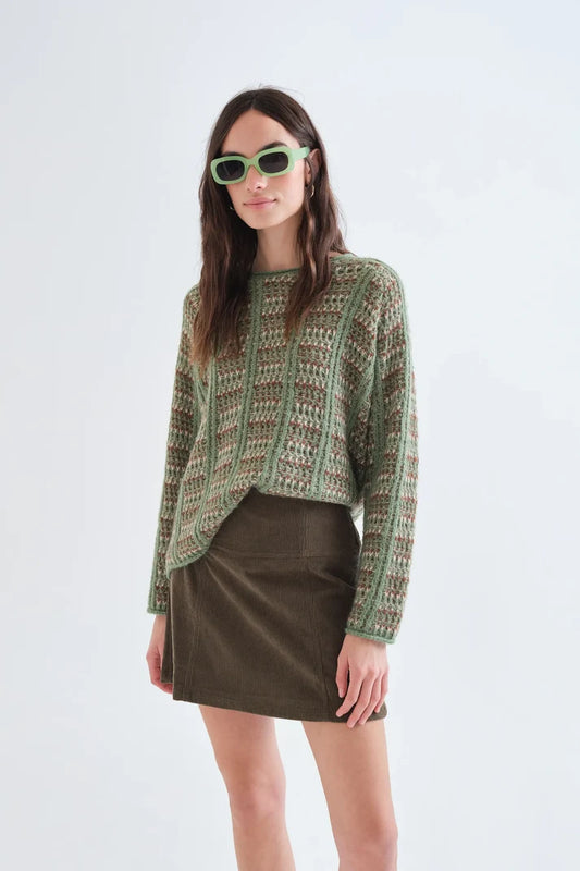 Maglione in maglia verde con dettagli ricamati