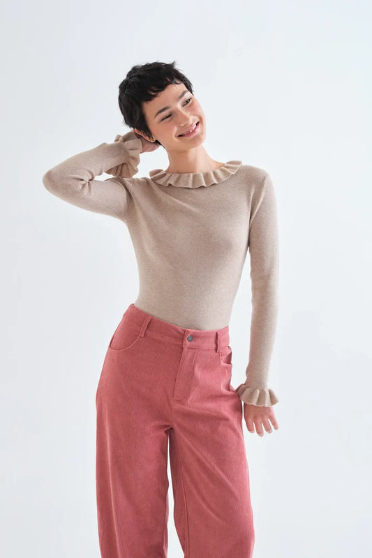 Top con volant in maglia beige