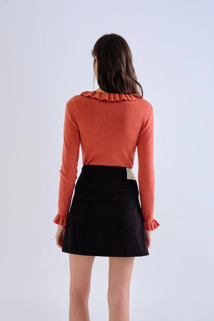 Top con volant in maglia ruggine