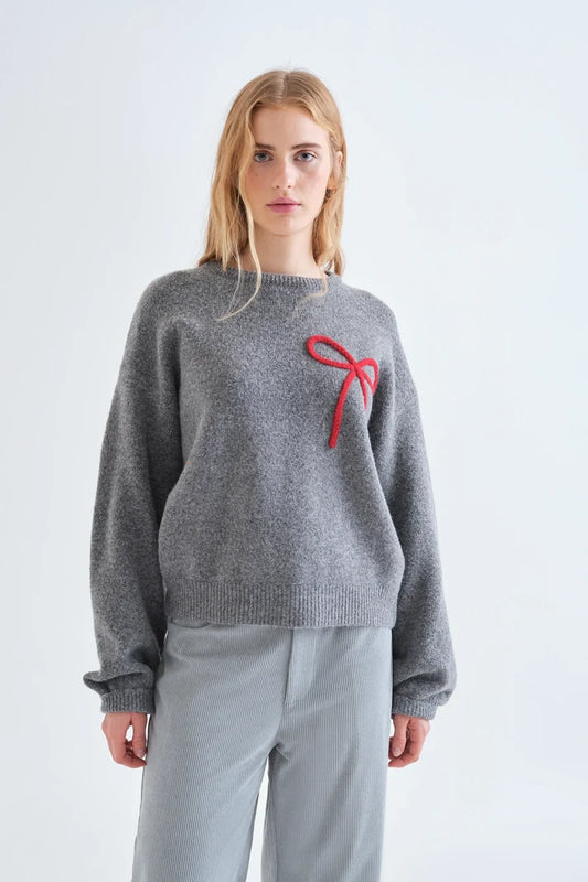 Maglia grigia con dettaglio fiocco rosso