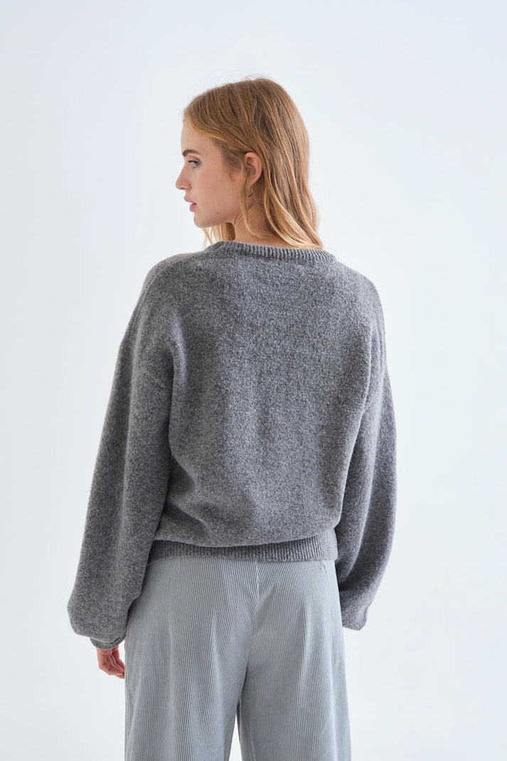 Maglia grigia con dettaglio fiocco rosso