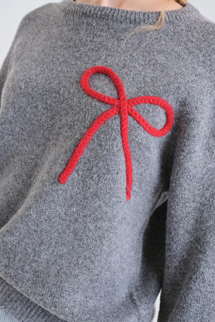 Maglia grigia con dettaglio fiocco rosso