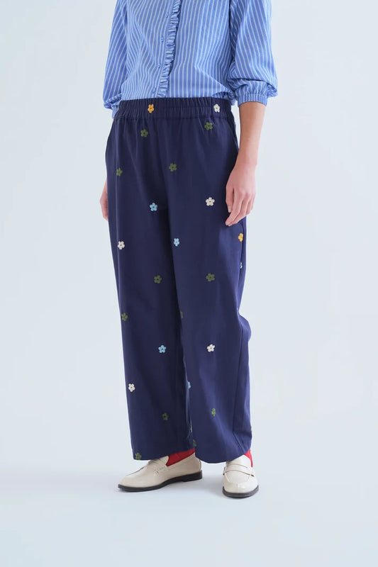 Pantaloni 100% cotone blu navy con ricamo floreale