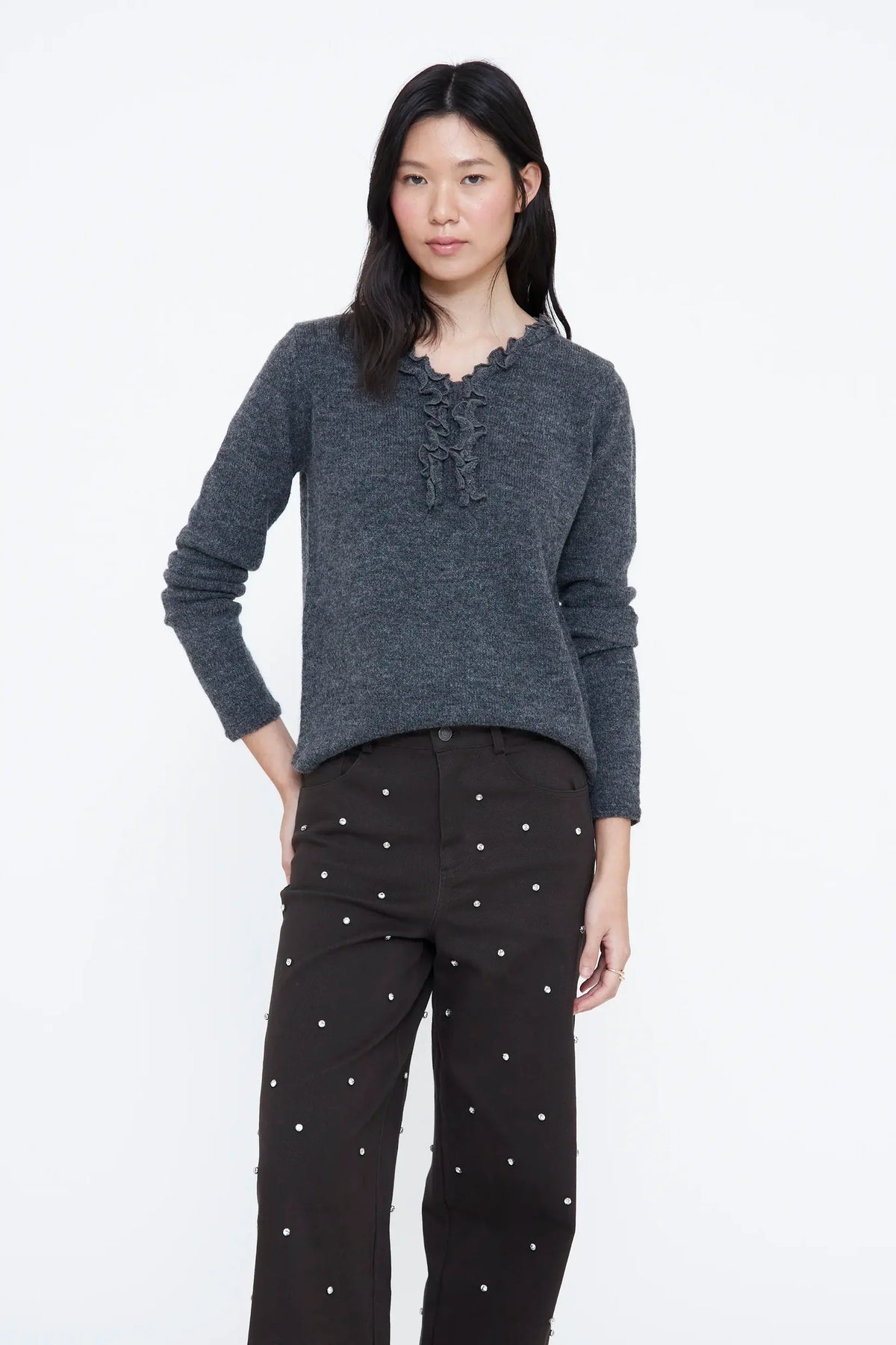 Maglia grigia con mini volant