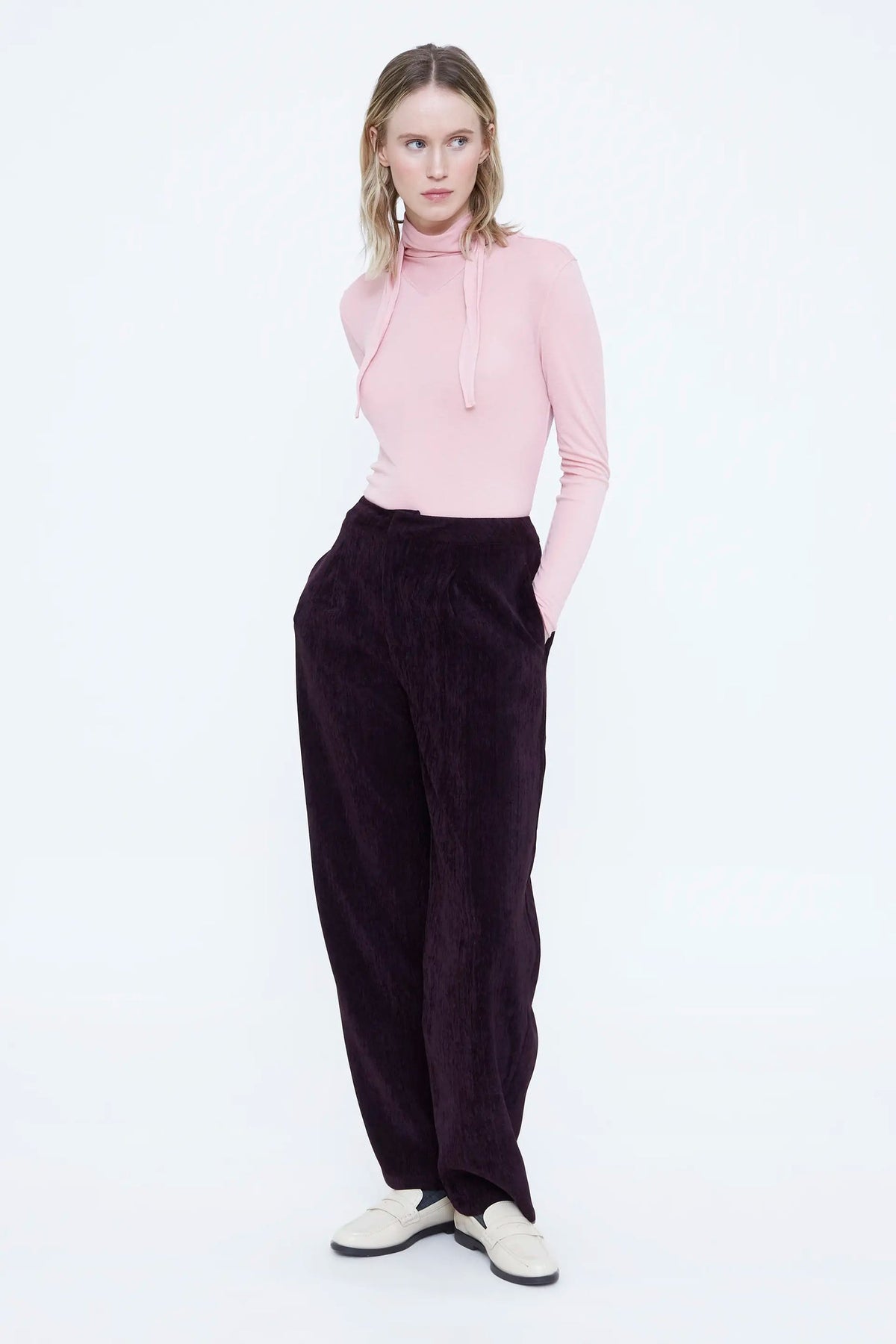 Pantaloni in velluto bordeaux