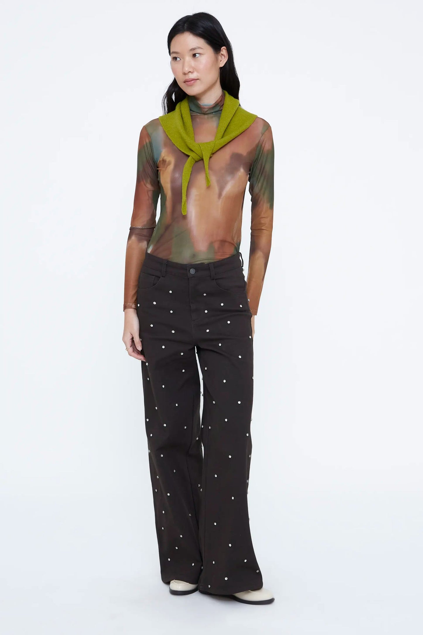 Jeans verde scuro con applicazioni