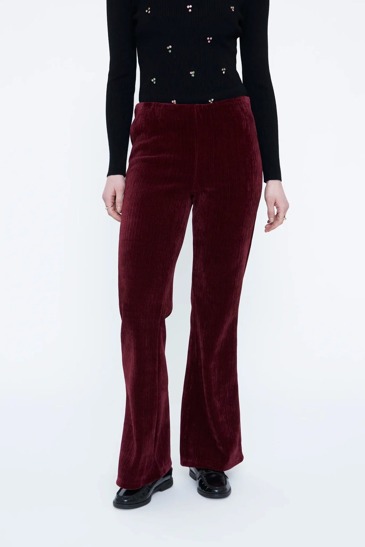 Pantaloni in velluto bordeaux