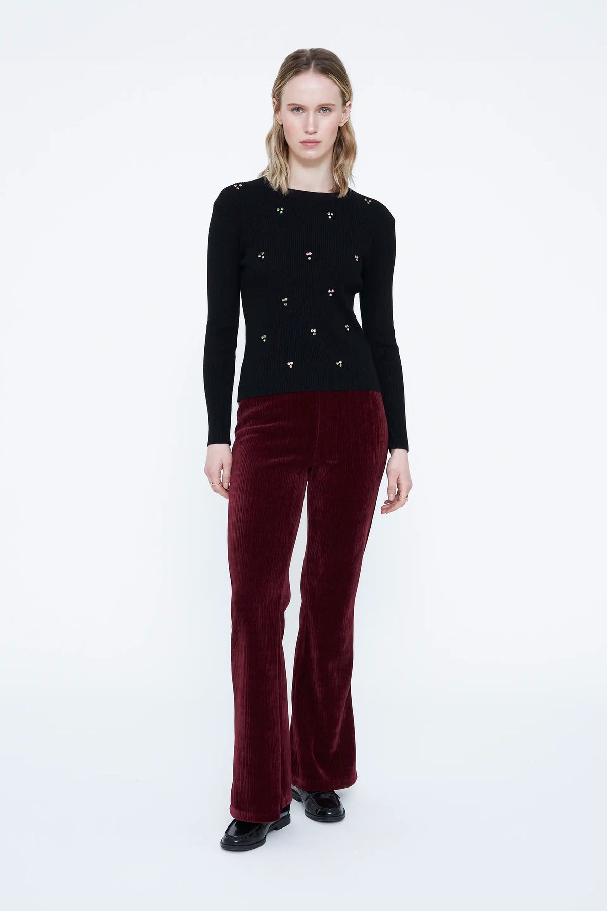 Pantaloni in velluto bordeaux