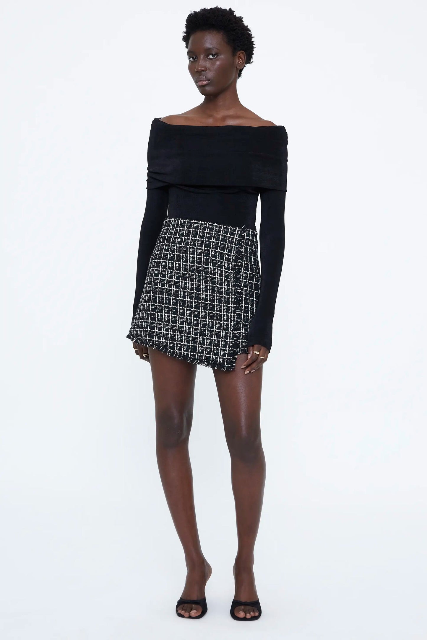 Gonna corta in tweed nero
