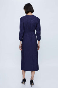 ABITO IN JACQUARD BLU CON SCOLLO A V