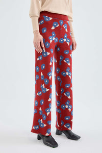 Pantaloni lunghi dritti in maglia con stampa floreale rossa