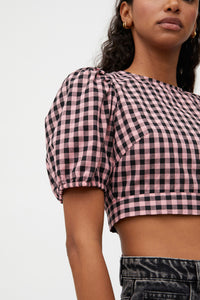 TOP CORTO CON STAMPA A QUADRETTI ROSA