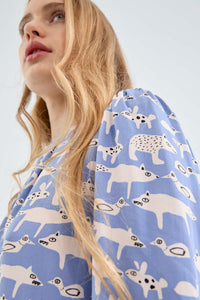 Top a maniche lunghe con stampa animali