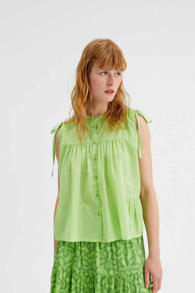 Top senza maniche con laccetti sulle spalle verde