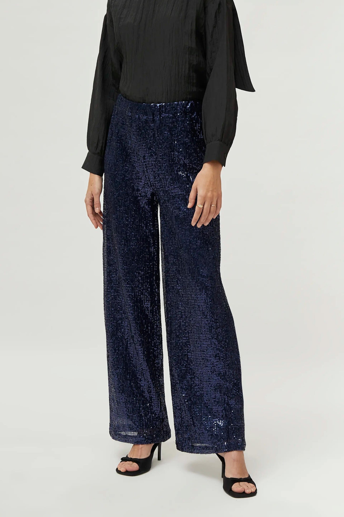 PANTALONI BLU CON PAILLETTES