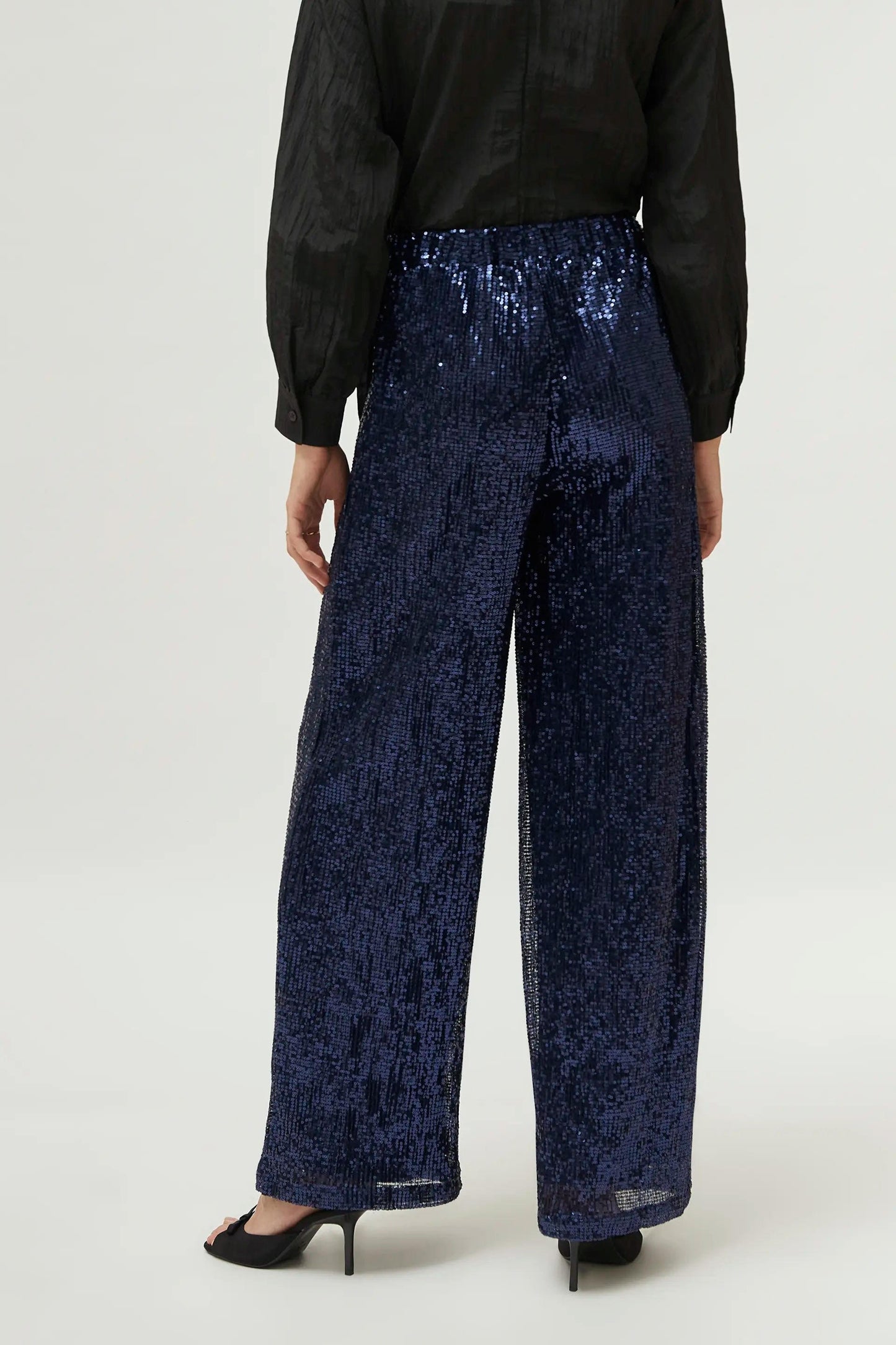 PANTALONI BLU CON PAILLETTES