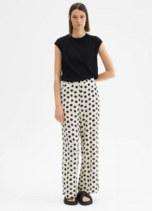 Pantaloni ampi alla caviglia con fantasia a pois